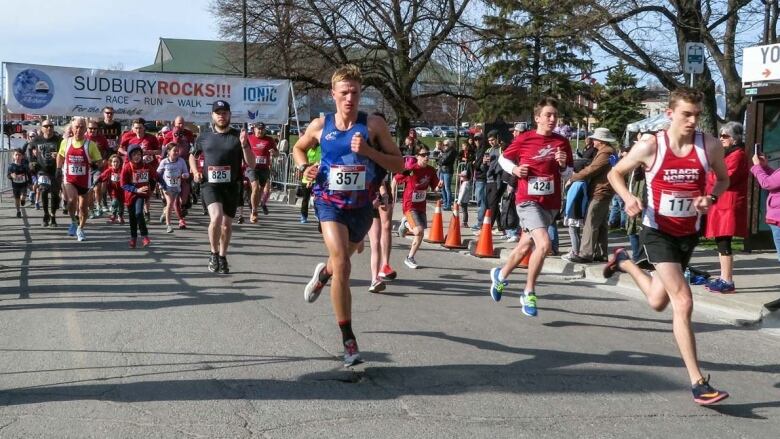 A group of runners running a marathon.