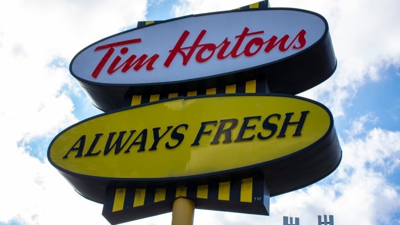 A sign for a Tim Hortons is shown.