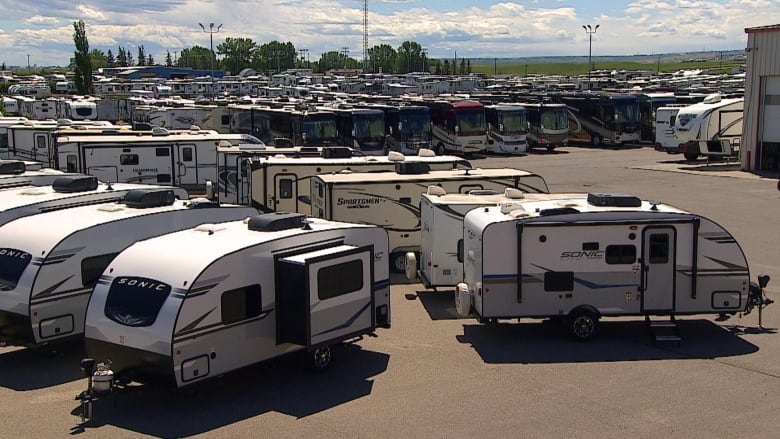 Trailers and motorhomes sit on the lot at Calgary's Bucars RV Centre. 