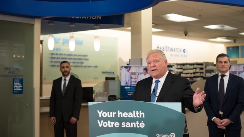 Ontario Premier Doug Ford speaks during a press conference at a Shoppers Drug Mart pharmacy in Toronto. 