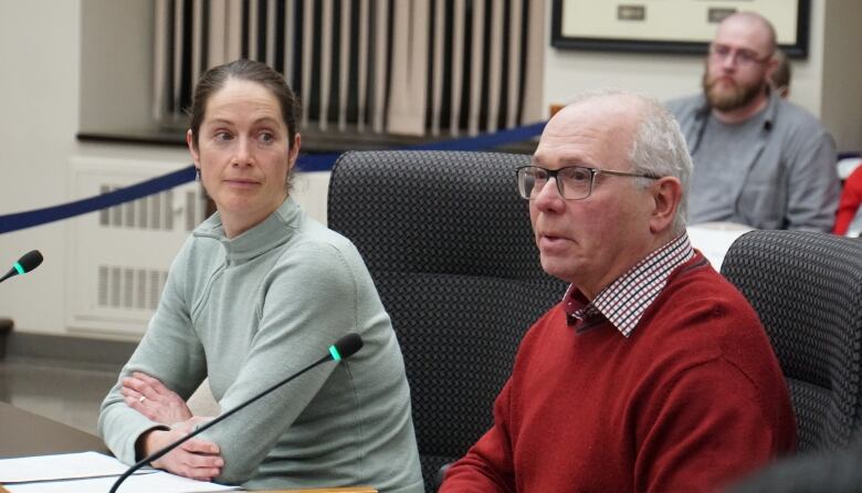 Ken Shields and Sarah Brown speak during the City of Thunder Bay's public pre-budget deputation meeting on Thursday night. They're advocating for the city to invest more money into protected active transportation lanes as council deliberates the 2023 budget.