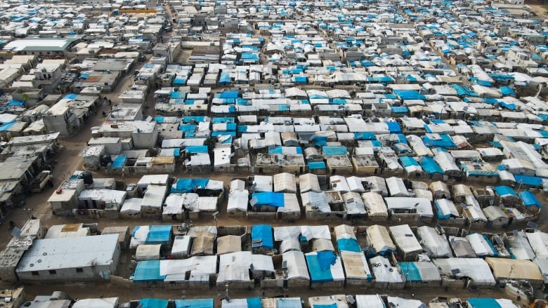 A general view of Karama camp for internally displaced Syrians, Monday, Feb. 14, 2022 by the village of Atma, Idlib province, Syria. 