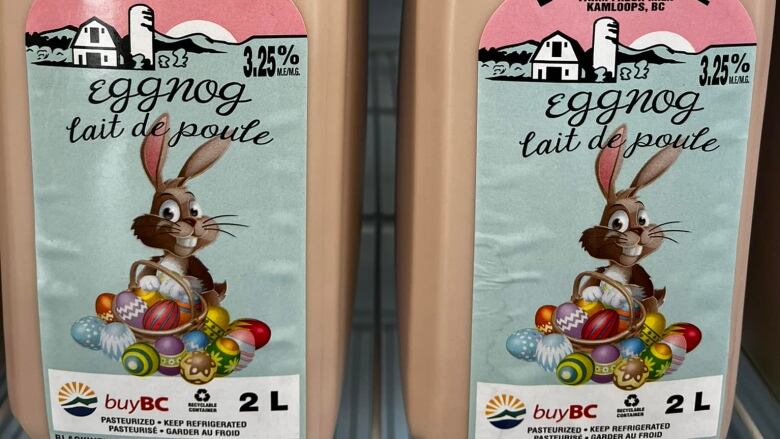 Two jugs of chocolate egg nog.