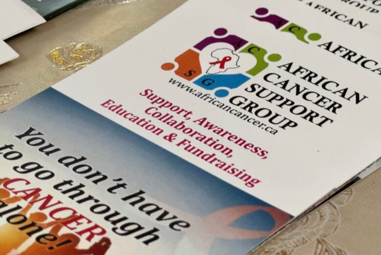 A cancer education leaflet sits on a table. 