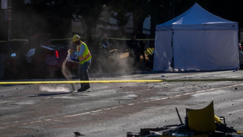 Debris of a car crash in a downtown road in Vancouver. 