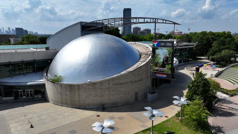 An aerial drone image shows a science centre.