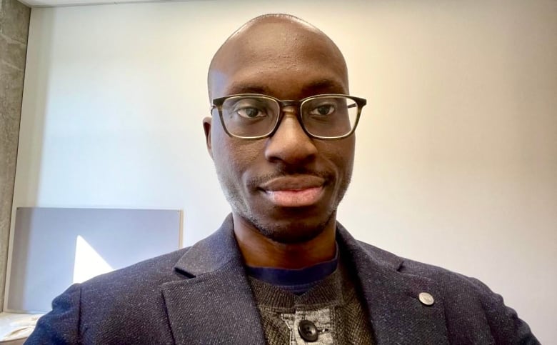 A headshot of Timothy Bryan, assistant sociology professor at the University of Toronto.