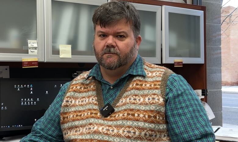 Neil Smith pictured in his office in Nanton.