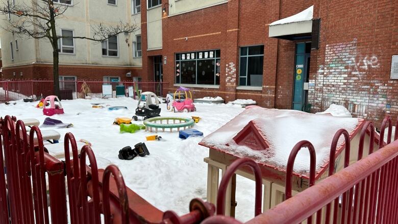 A daycare's outdoor play area in winter.