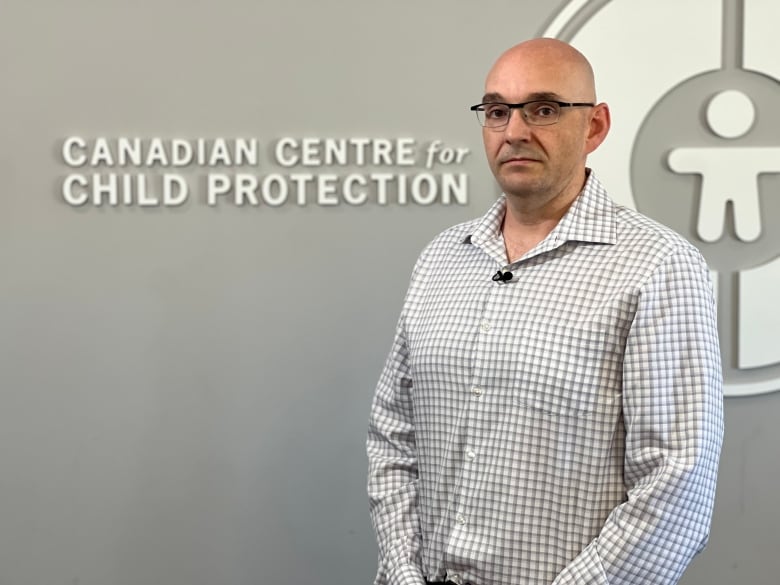 A bald man stands in front of text that reads 'Canadian Centre for Child Protection'.