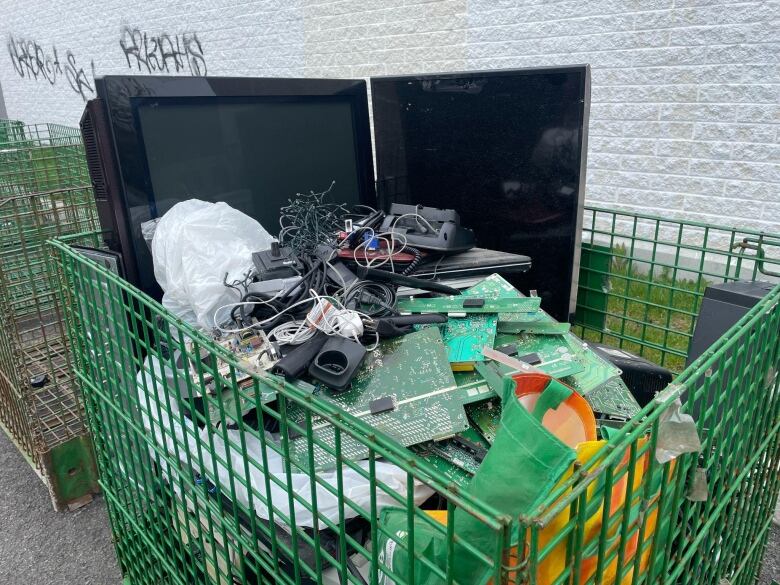 a cart full of parts for electronics