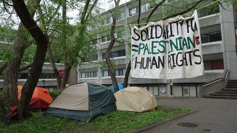 A large, white banner referring to 