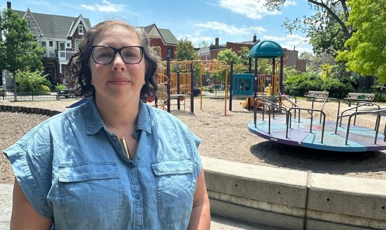 Photo of Carolyn Ferns outdoors with a playground in the background