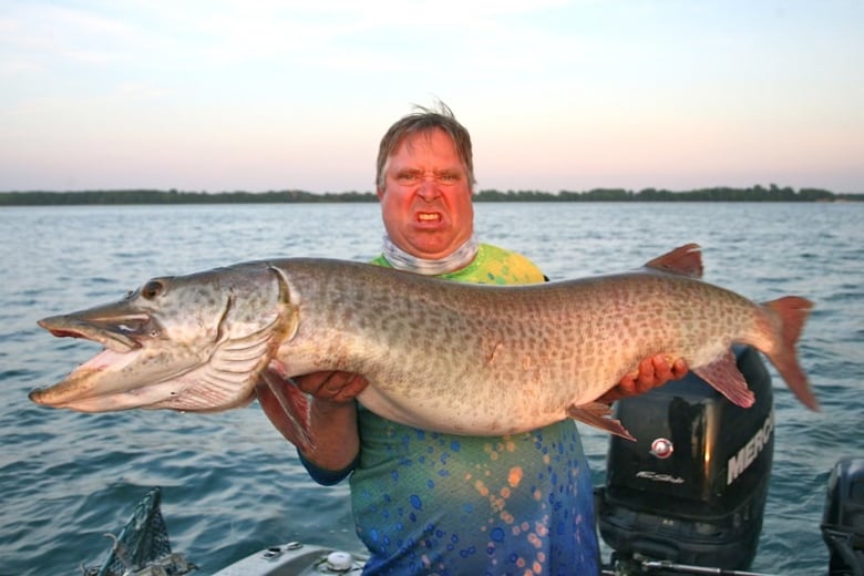 man holds giant fish