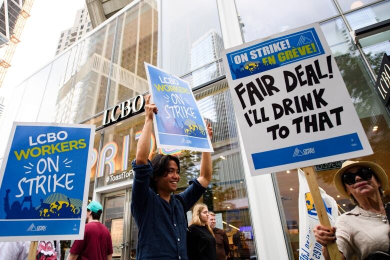 LCBO Workers and supporters hold a strike rally at a picket line in front of an LCBO store in Toronto on July 6, 2024.