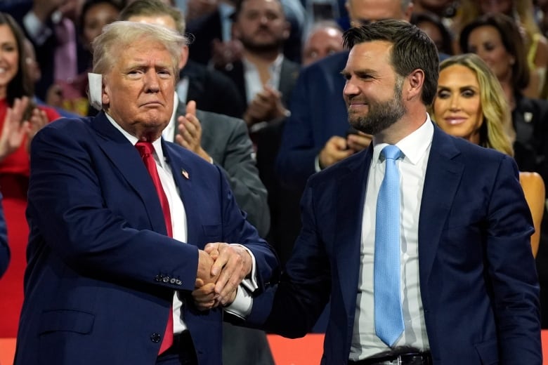 Republican presidential candidate former President Donald Trump and Republican vice presidential candidate Sen. JD Vance, R-Ohio, attend the first day of the Republican National Convention, Monday, July 15, 2024, in Milwaukee.