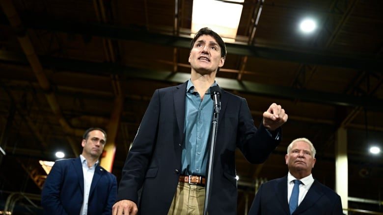 Prime Minister Justin Trudeau is joined by Ontario Premier Doug Ford and Liberal MP Mark Gerretsen at a question and answer session after an announcement at Goodyear plant in Napanee, Ont., on Monday, Aug. 12, 2024.