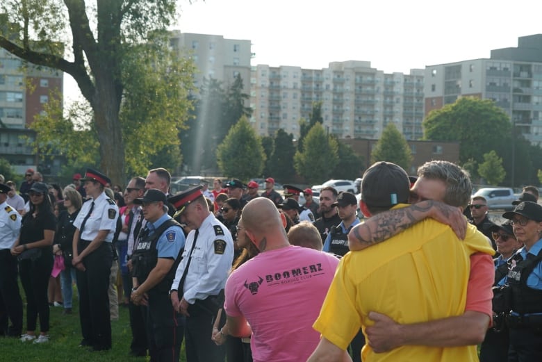 Many first responders who searched for Bielli solemly stood by at the vigil to show their support for the family and community.