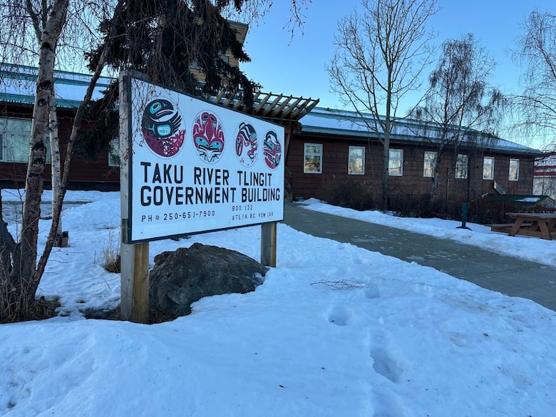 An office with a sign outside the says Taku River Tlingit Government Building